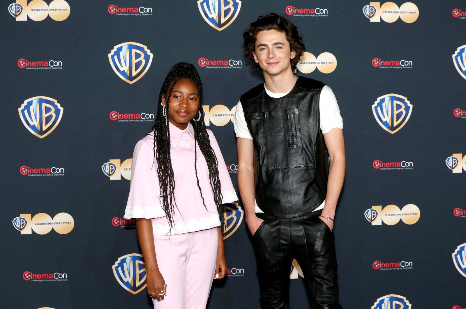 Calah Lane (L) and Timothee Chalamet, promoting the movie &quot;Wonka,&quot; attend a Warner Bros. presentation during CinemaCon, the official convention of the National Association of Theatre Owners, in Las Vegas, Nevada, U.S., April 25, 2023. (Reuters Photo)