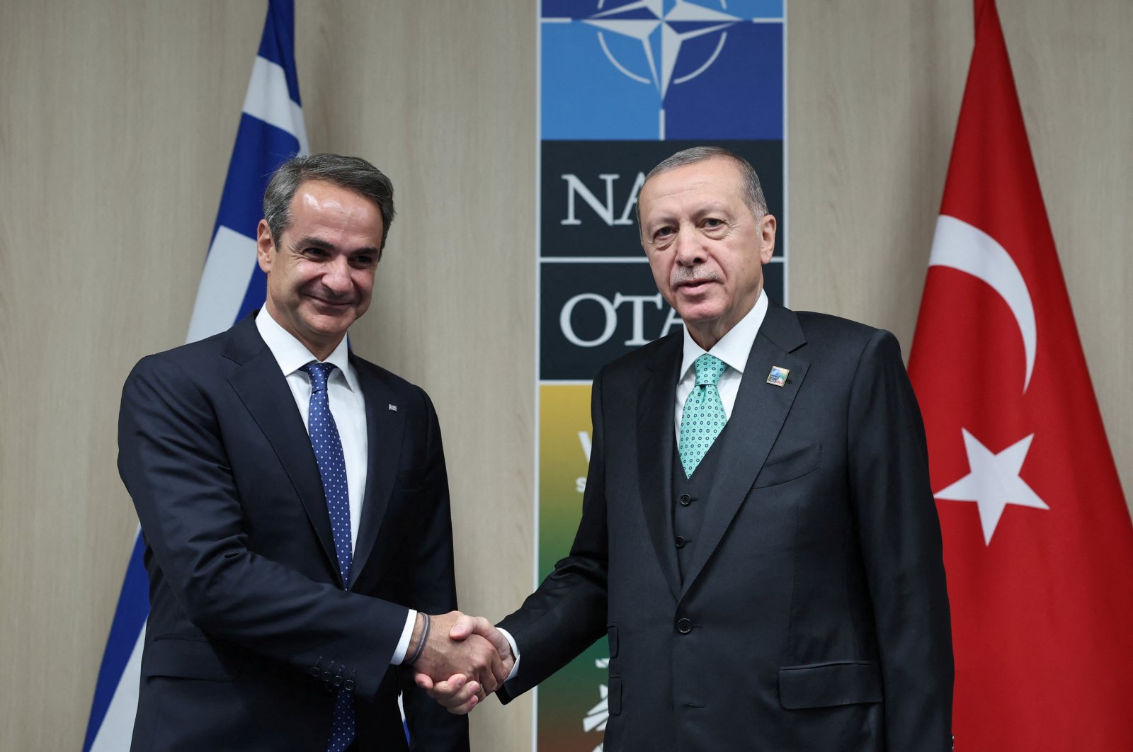 President Recep Tayyip Erdoğan (R) meets with Greek Prime Minister Kyriakos Mitsotakis during a NATO leaders summit in Vilnius, Lithuania, July 12, 2023. (Reuters Photo)