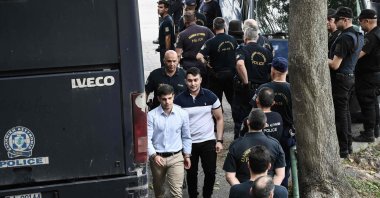Individuals convicted for the murder of the late football fan Alkis Kampanos, who was killed by young hooligans, arrive at the courthouse, Thessaloniki, Greece, July 12, 2023. (AFP Photo)