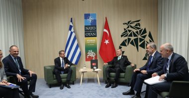 President Recep Tayyip Erdoğan (center R) and Greek Prime Minister Kyriakos Mitsotakis (center L) hold talks in Vilnius, Lithuania, July 12, 2023. (AA Photo)