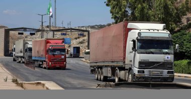 The entry of the first United Nations aid convoy through the Bab al-Hawa border crossing with Türkiye, July 28, 2022. (AFP File Photo)