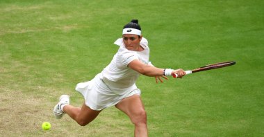 Tunisia’s Ons Jabeur in action during her semifinal match against Belarus’ Aryna Sabalenka at the All England Lawn Tennis and Croquet Club, London, U.K., July 13, 2023. (Reuters Photo)