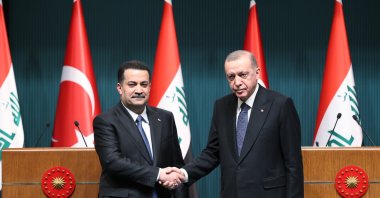 President Recep Tayyip Erdoğan (R) shakes hands with Iraqi Prime Minister Mohammed S. Al Sudani during a meeting in the capital Ankara, Türkiye, March 22, 2023. (DHA Photo)