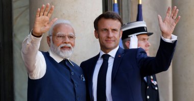 France&#039;s President Emmanuel Macron (R) welcomes India&#039;s PM Narendra Modi at The Elysee Presidential Palace, Paris, France, July 14, 2023. (AFP Photo)