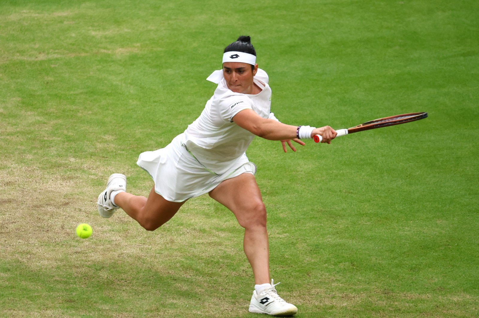 Tunisia’s Ons Jabeur in action during her semifinal match against Belarus’ Aryna Sabalenka at the All England Lawn Tennis and Croquet Club, London, U.K., July 13, 2023. (Reuters Photo)