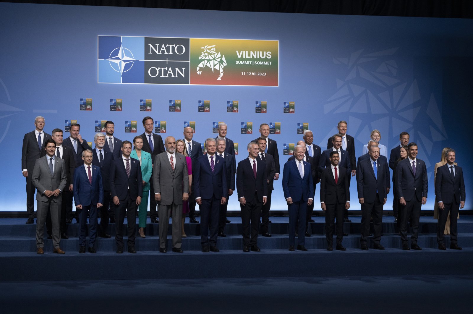 Heads of States and Governments along with NATO Secretary-General Jens Stoltenberg (front row, 6-L) pose for the official group photo at the NATO summit in Vilnius, Lithuania, July 11, 2023. (AP Photo)