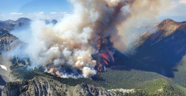This undated handout photo provided by the British Columbia Wildfire Service on July 9, 2023, shows an aerial view of the Texas Creek wildfire, located approximately 27km (16.78 miles) south of Lillooet, British Columbia, Canada. (B.C. Wildfire Service via AFP) 