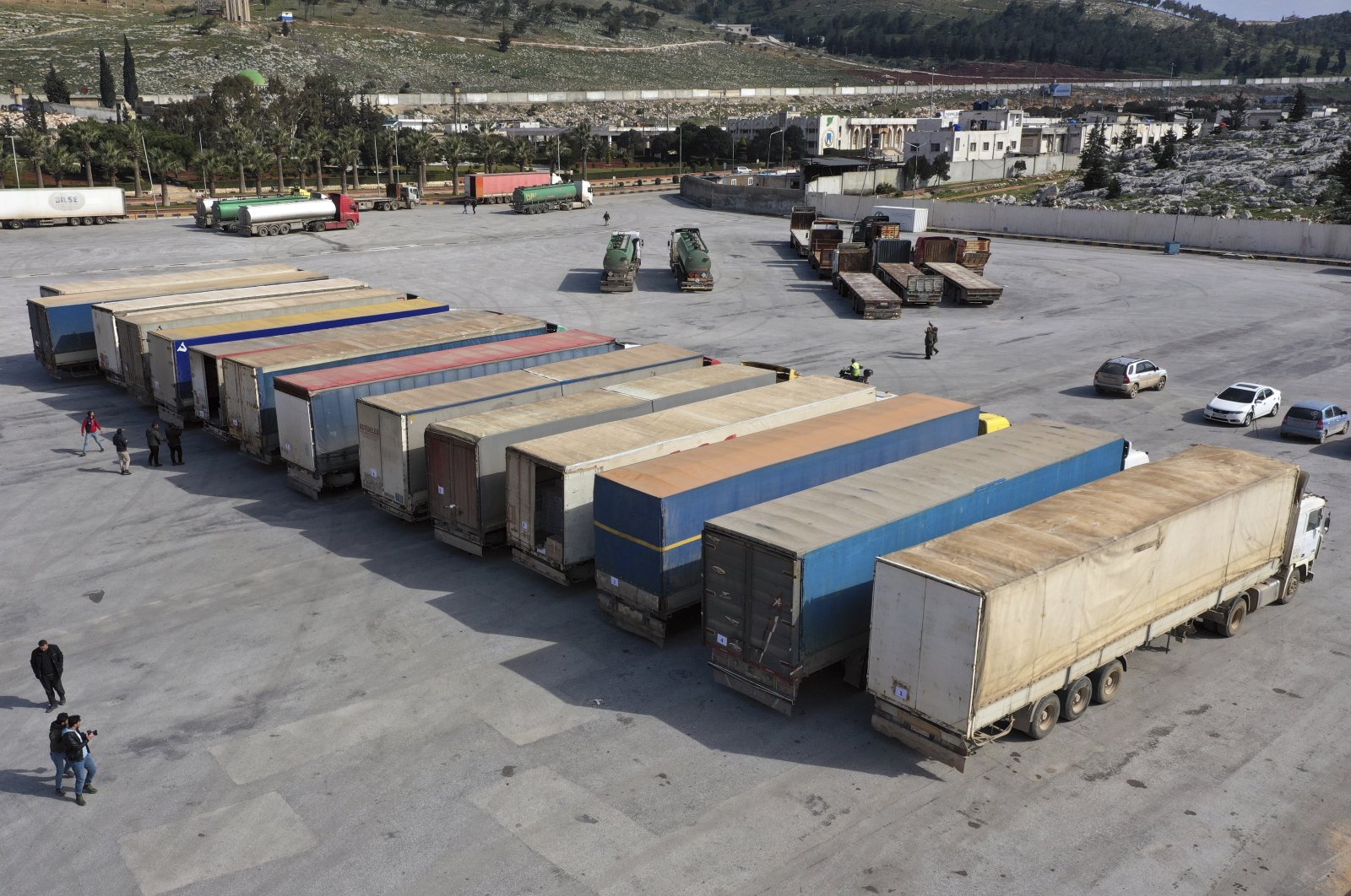 Trucks loaded with U.N. humanitarian aid for Syria following a devastating earthquake reach the Bab al-Hawa border crossing with Türkiye, Idlib province, Syria, Friday, Feb. 10, 2023.  (AP File Photo)
