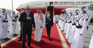 President Recep Tayyip Erdoğan inspects the Qatari honor guard at Doha Airport before a meeting with Emir of Qatar Sheikh Tamim bin Hamad Al Thani, Doha, Qatar, July 2, 2020. (AP Photo)