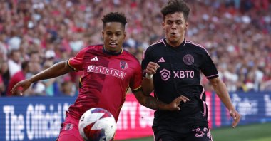 St. Louis City defender Akil Watts (L) and Inter Miami defender Noah Allen vie for the ball during an MLS match, St. Louis, U.S., July 15, 2023. (AP Photo)