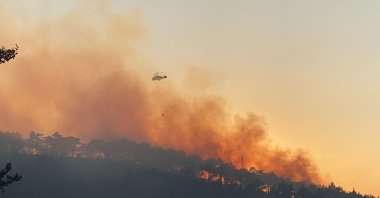 Helicopters extinguish a fire in Hatay&#039;s Belen district, Türkiye, July 16, 2023. (AA Photo)