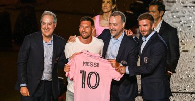 Argentine soccer star Lionel Messi (2nd L) is presented by (from R) owners of Inter Miami CF David Beckham, Jose R. Mas and Jorge Mas as the newest player for Major League Soccer's Inter Miami CF, at DRV PNK Stadium in Fort Lauderdale, Florida, U.S., July 16, 2023. (AFP Photo)
