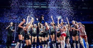 The Turkish national women&#039;s volleyball team players celebrate winning the FIVB Nations League title after beating China at the College Park Center, Texas, U.S., July 16, 2023. (AA Photo)