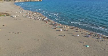 An aerial view shows holidaygoers enjoying the sea at Patara Beach, in Antalya, Türkiye, July 15, 2023. (AA Photo)