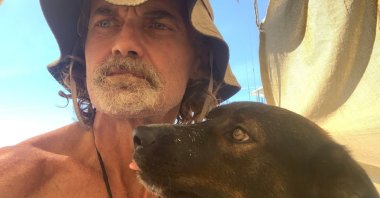 Tim Shaddock and his dog were rescued after 2 months at sea. (Photo courtesy: 9News)