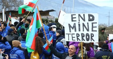 Activists protest environmental pollution caused by Armenia in Lachin Corridor, an area connecting Karabakh to Armenia, in Karabakh, Azerbaijan, Dec. 13, 2022. (AA Photo)