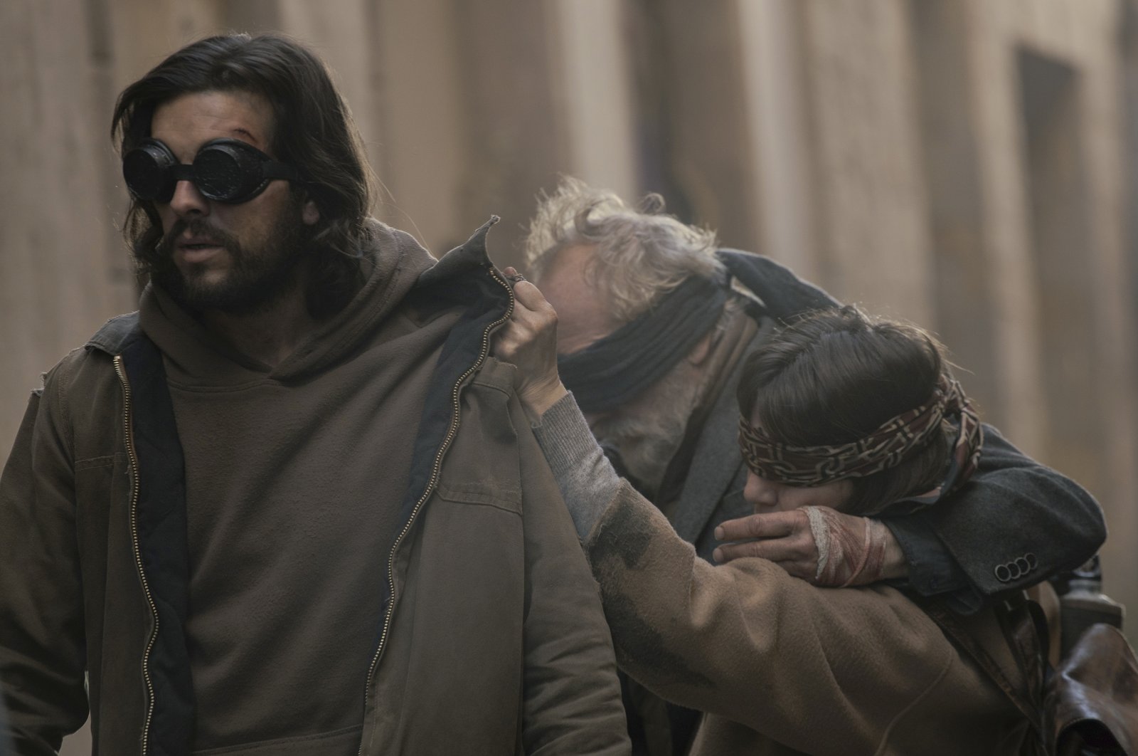 This image released by Netflix shows, from left, Mario Casas, Gonzalo de Castro, and Lola Duenas in a scene from &quot;Bird Box: Barcelona.&quot; (AP Photo)