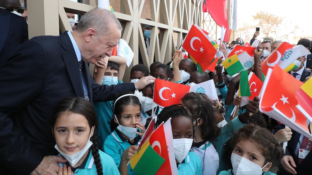President Recep Tayyip Erdoğan greets children during the inauguration ceremony of an official building of Türkiye&#039;s Dakar Embassy, in Dakar, Senegal, Feb. 2, 2022. (AA Photo)