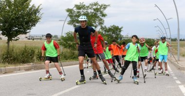 The Muş ski team athletes train on asphalt and in the mountains in preparation of the Winter Championships, Hakkari, Türkiye, June 23, 2023. (AA Photo)