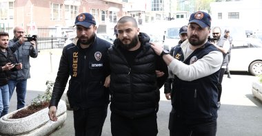 Faruk Fatih Özer, the founder and CEO of the collapsed crypto exchange Thodex, is being brought to Istanbul Police Department, in Istanbul, Türkiye, April 20, 2023. (AA Photo)
