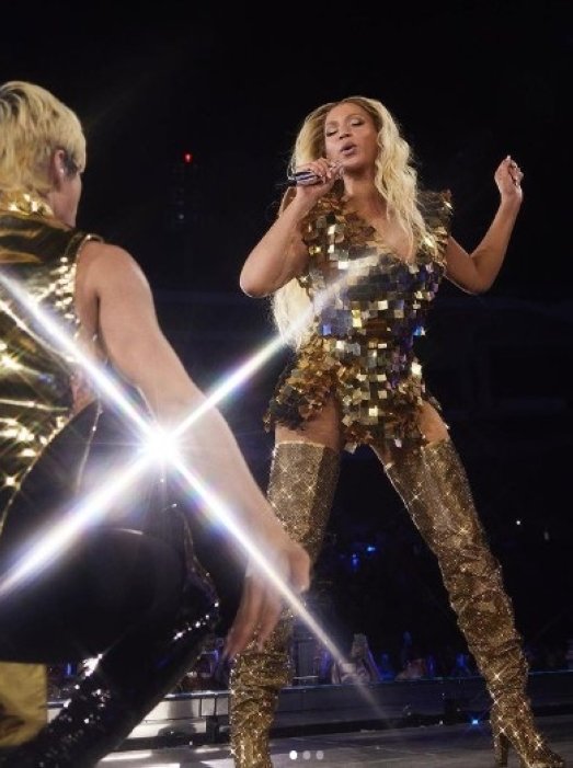 Beyonce wears the custom Raisa &amp; Vanessa gold sequin set during her Renaissance World Tour. ( @raisavanessa / Instagram)
