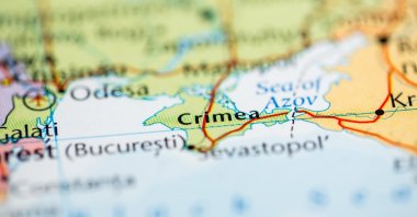 Over 2,000 civilians were evacuated after a fire broke out at a military training field in annexed Crimea.