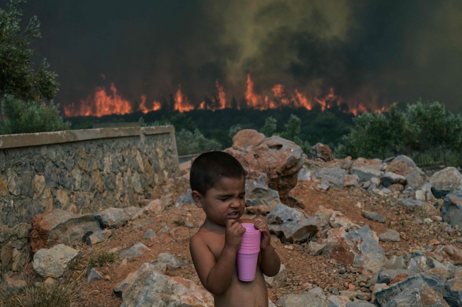 Fires, health risks mount amid extreme heat across 3 continents