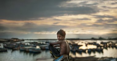 &quot;Boy on the Boat,&quot; India, 2014. (Photo courtesy of Istanbul Modern)