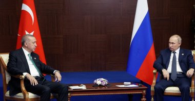 President Recep Tayyip Erdoğan (L) and Russian President Vladimir Putin meet on the sidelines of the sixth summit of the Conference on Interaction and Confidence-building Measures in Asia (CICA), in Astana, Kazakhstan, Oct.13, 2022. (Reuters Photo)