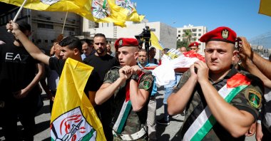 Mourners carry the body of a Palestinian teen killed by Israeli army in Nablus, in the Israeli-occupied West Bank, July 20, 2023. (Reuters Photo)