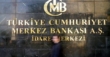 A logo of the Central Bank of the Republic of Türkiye (CBRT) at the entrance of its headquarters in Ankara, Türkiye, Oct. 15, 2021. (Reuters Photo)