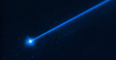 When a NASA spacecraft deliberately slammed into an asteroid last year, it sent dozens of boulders skittering into space, images from the Hubble telescope showed, July 20, 2023. (AFP Photo)
