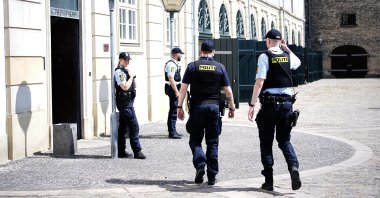 Police officers guard the entrance to the Eigtveds Pakhus, a venue for international meetings and conferences used by Denmark's Ministry of Foreign Affairs, in Copenhagen, Denmark, June 24, 2023. (EPA File Photo)