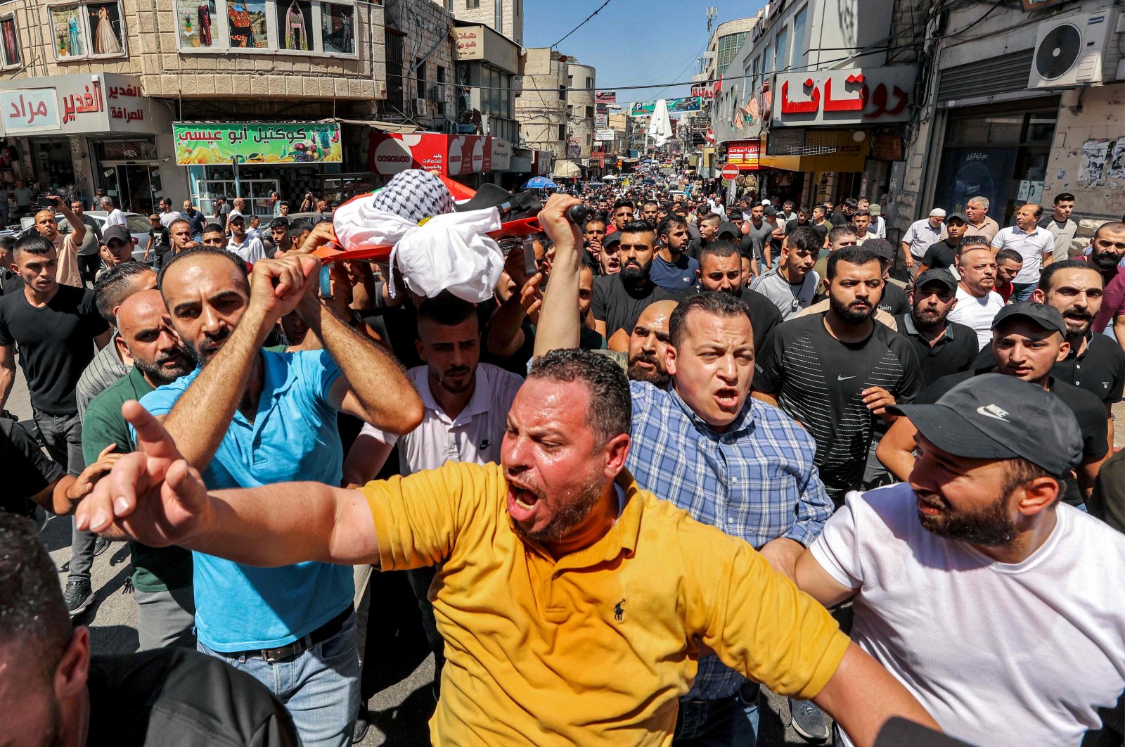 Mourners carry the body of Palestinian Bader al-Masri, who was killed while the Israeli army was securing &quot;the coordinated entrance of Israeli civilians to Joseph&#039;s Tomb&quot;, during the funeral in the city of Nablus in the north of the occupied West Bank, Palestine, July 20, 2023. (AFP Photo)