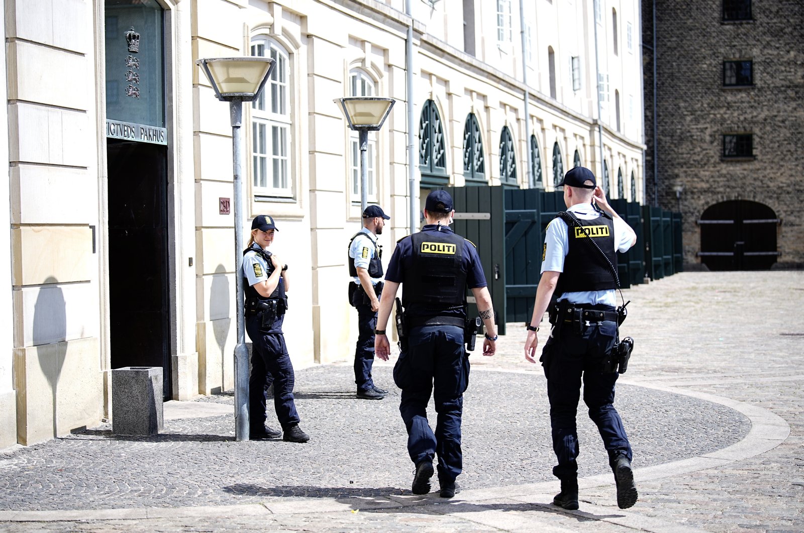 Police officers guard the entrance to the Eigtveds Pakhus, a venue for international meetings and conferences used by Denmark&#039;s Ministry of Foreign Affairs, in Copenhagen, Denmark, June 24, 2023. (EPA File Photo)