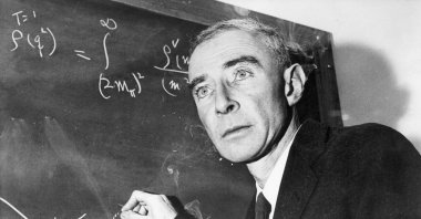 Robert Oppenheimer in front of a blackboard. (Getty Images Photo)