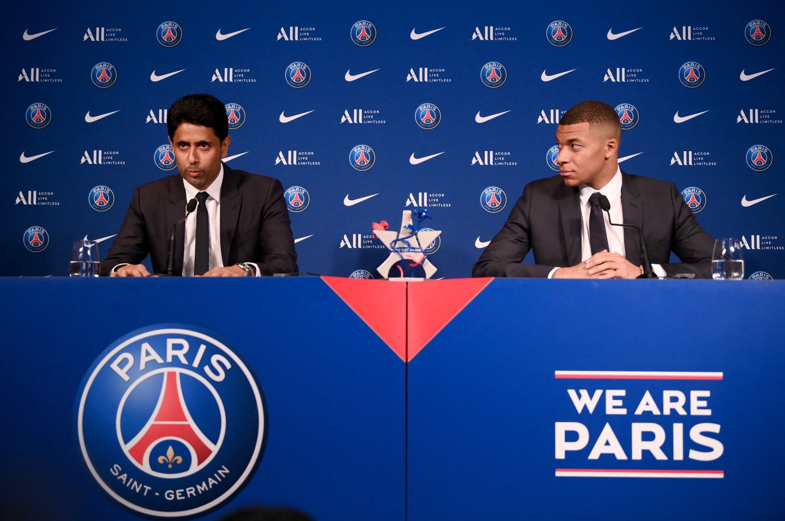 Paris Saint-Germain&#039;s CEO Nasser Al-Khelaifi (L) and French forward Kylian Mbappe (R) give a press conference at the Parc des Princes stadium, Paris, France, May 23, 2022. (AFP Photo)