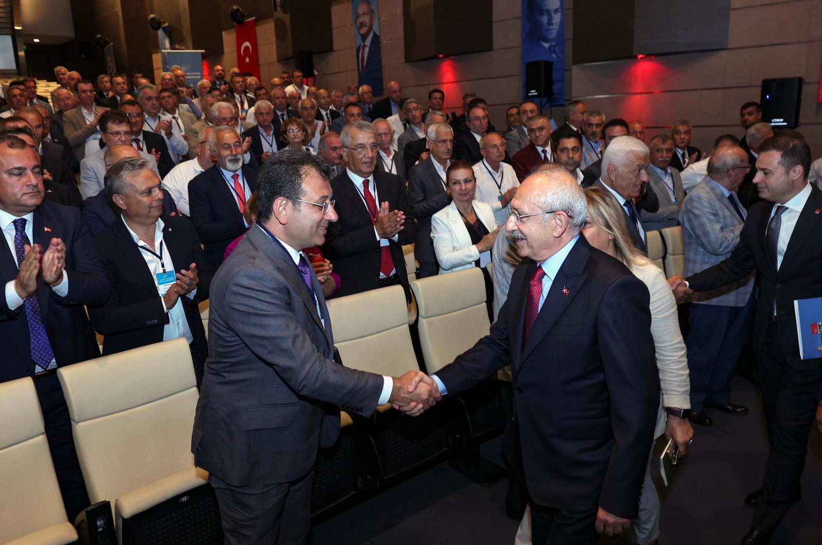Kemal Kılıçdaroğlu (R) shakes hands with Istanbul Mayor Ekrem Imamoğlu during the event in the capital Ankara, Türkiye, July 22, 2023. (DHA Photo)