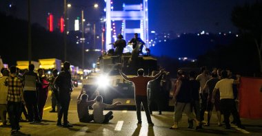 People take over a tank hijacked by putschists in Istanbul, Türkiye, July 16, 2016. (AFP Photo)