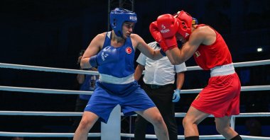 Türkiye&#039;s Busenaz Sürmeneli (L) punches Belgium&#039;s Oshin Derieuw during the boxing match at 3rd European Games at the Nowy Targ Arena, Nowy Targ, Poland, July 1, 2023. (AA Photo)