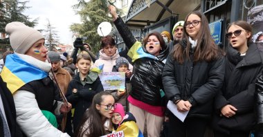 Ukrainians protest to draw attention to the fact that many children were killed in the ongoing Russian occupation of Ukraine in front of the Ukrainian Embassy in Ankara, Türkiye, March 19, 2022. (AFP Photo)