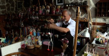 Orhan Karaalioğlu in his workshop, in Ankara, Türkiye, July 23, 2023. (AA Photo)