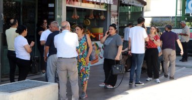 People on the streets following the earthquake, in Adana, southern Türkiye, July 25, 2023. (DHA Photo) 