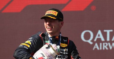 Race winner Max Verstappen celebrates on the podium during the F1 Grand Prix of Hungary at Hungaroring, Budapest, Hungary, July 23, 2023. (Getty Images Photo)