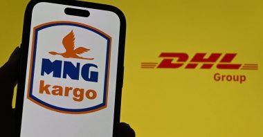 The DHL and MNG Kargo logos are seen in this photo provided on July 25, 2023. (AA Photo)