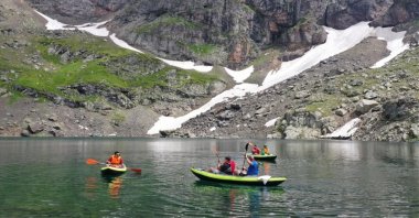 Canoeists enjoy the scenic atmosphere of one of the glacial lakes in Giresun, northern Türkiye, July 25, 2023. (AA Photo)