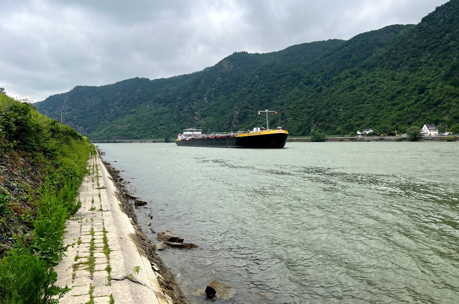 A Dutch-made special tanker, built by shipping company Stolt Tankers, able to pass on the Rhine river even at low water levels which occur increasingly often due to global warming, sails past Bad Salzig, Germany, May 23, 2023. (Reuters Photo)