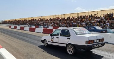  A car in action during the Kepez Automobile and Motorsports Club drag racing, Antalya, Türkiye, July 9, 2023. (IHA Photo)