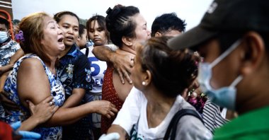 Relatives of the victims mourn at Binangonan port, Rizal province, Philippines, July 27, 2023. (EPA Photo)