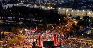 Protesters hold Israeli flags as they demonstrate following a parliament vote on a contested bill that limits Supreme Court powers to void some government decisions, near the Knesset, West Jerusalem, Israel, July 24, 2023. (Reuters Photo)